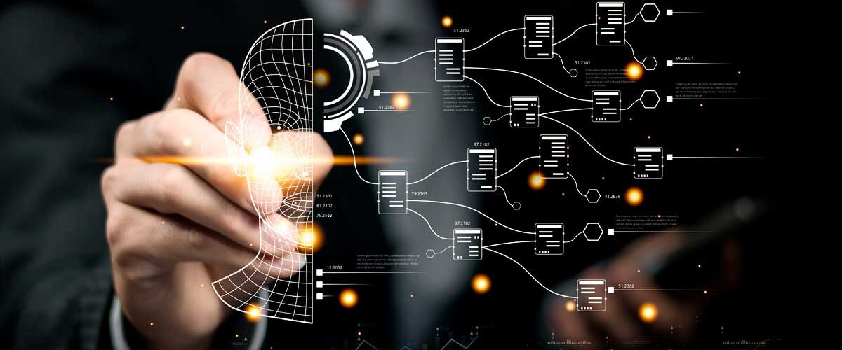 Mão digitando sobre tela digital com perfil virtual, fluxos de dados e bancos de informações conectados, representando o uso da automação inteligente e inteligência artificial para otimizar o marketing imobiliário.